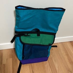 Mer Small Basic Backpack roll top – Turquoise, Green, Navy, Purple front pocket